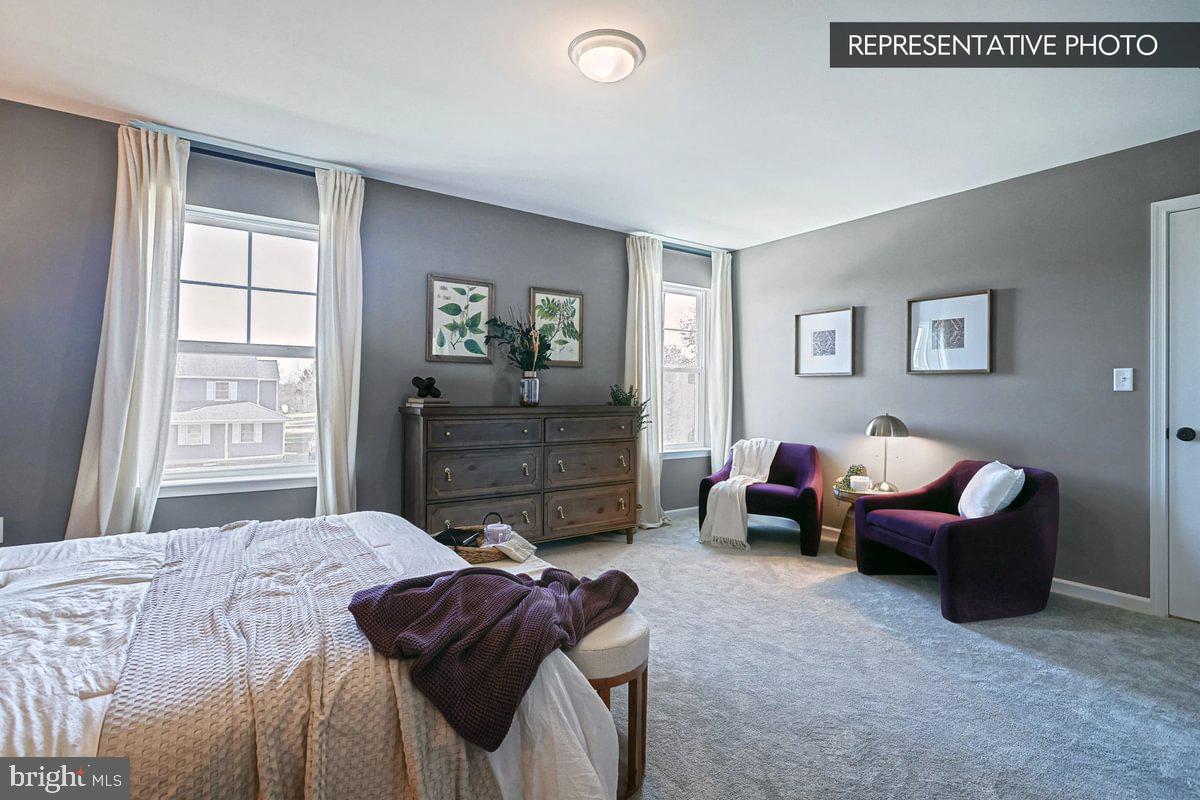 6316 Liam Drive Spring Grove, PA 17362 - Photo 18 of 20 a bedroom with a bed and a couch