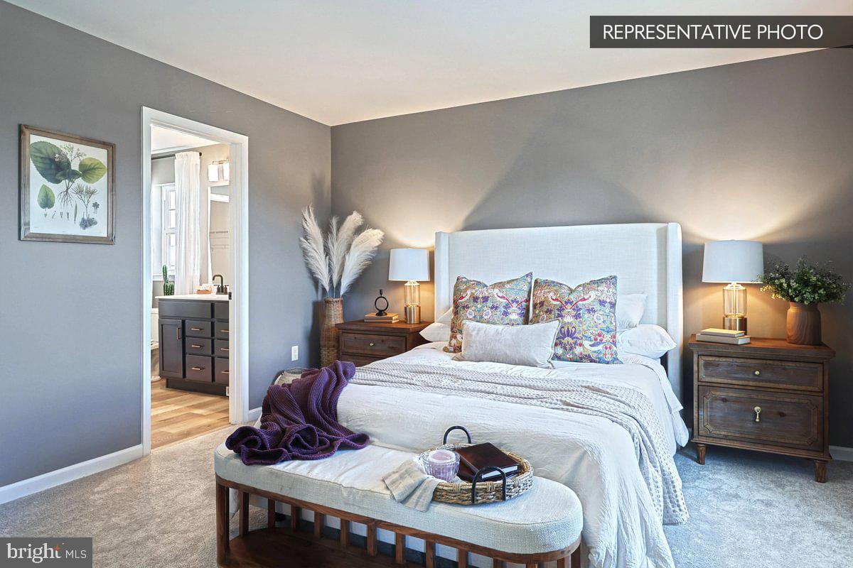 6316 Liam Drive Spring Grove, PA 17362 - Photo 19 of 20 a bedroom with a bed and wooden floor