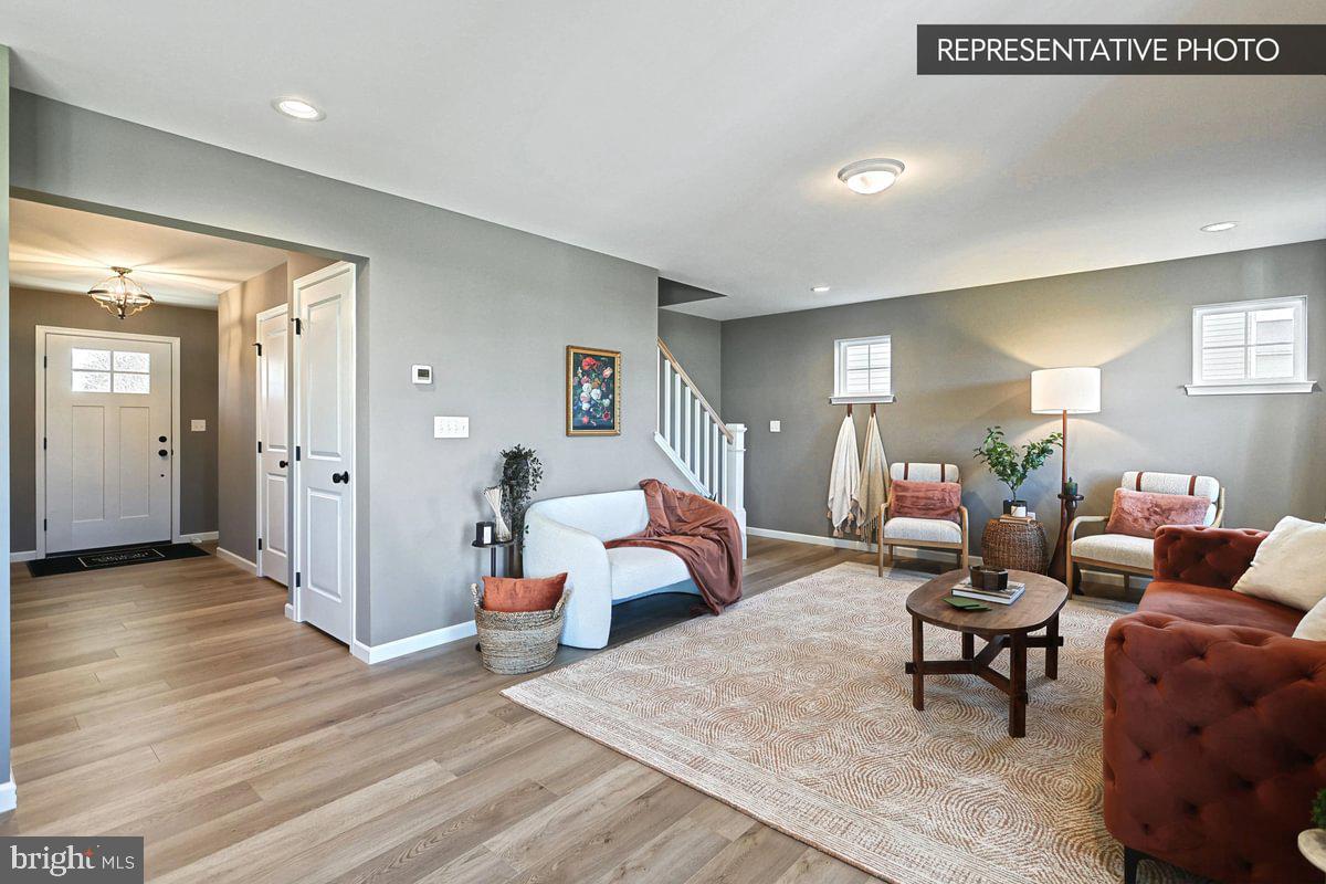 6316 Liam Drive Spring Grove, PA 17362 - Photo 10 of 20 a living room with furniture and a wooden floor