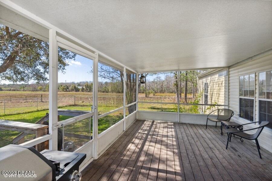 4568 Treebrook Road New Smyrna Beach, FL 32168 - Photo 18 of 41 Rear 19x10 Screened Porch