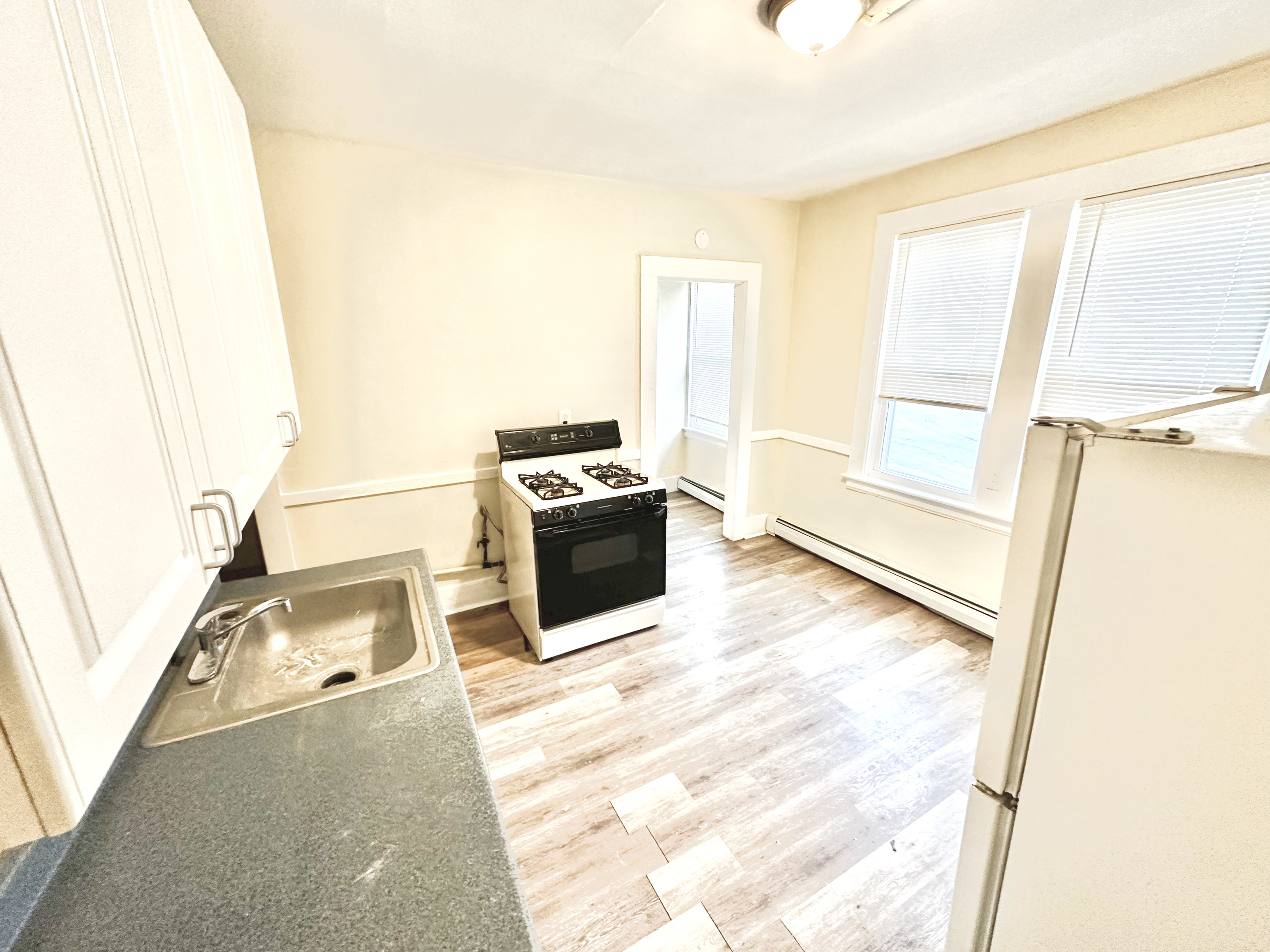 1019 West Main Street, Unit 3L Waterbury, CT 06708 - Photo 18 of 29 a view of a living room with a couch