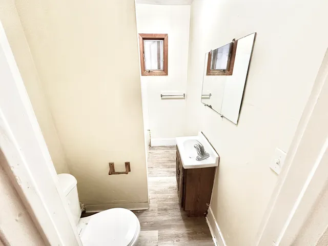 a bathroom with a sink a mirror and a bathtub