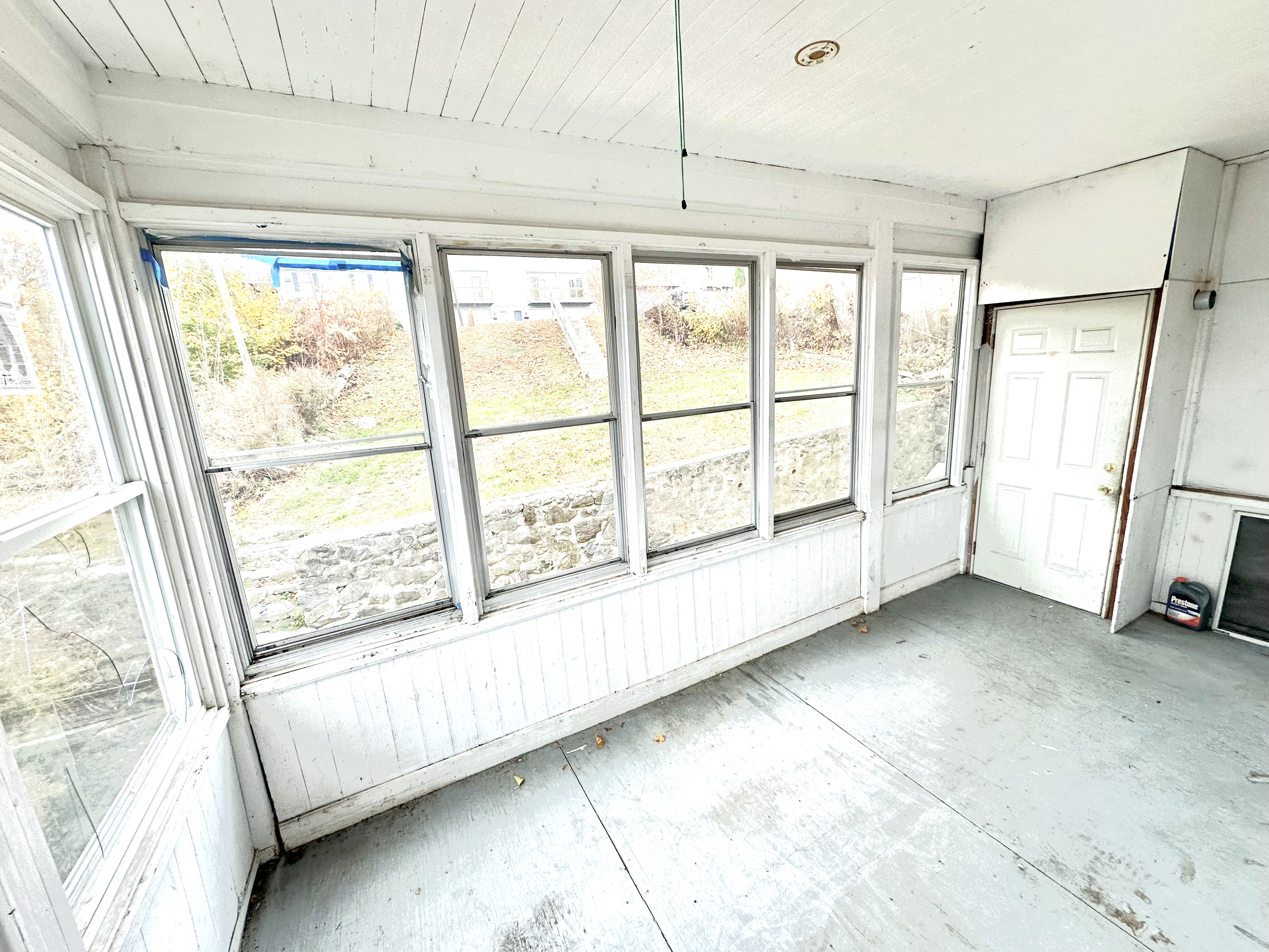 1019 West Main Street, Unit 3L Waterbury, CT 06708 - Photo 25 of 29 a view of an empty room with a window