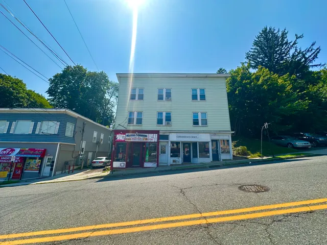 a view of a building with a street