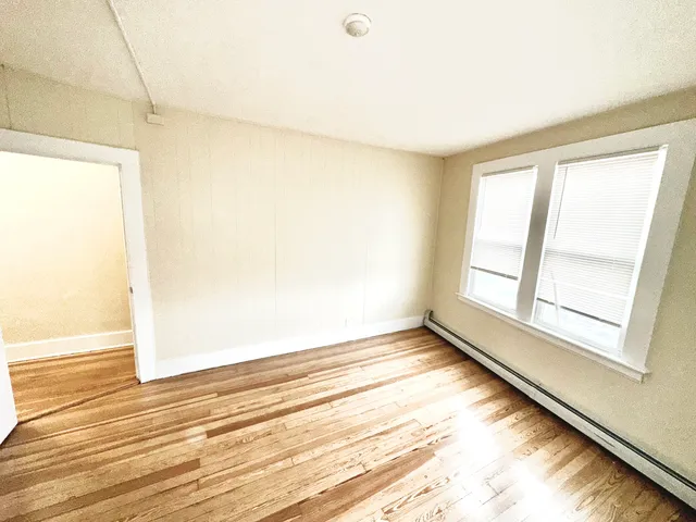 a view of an empty room and window