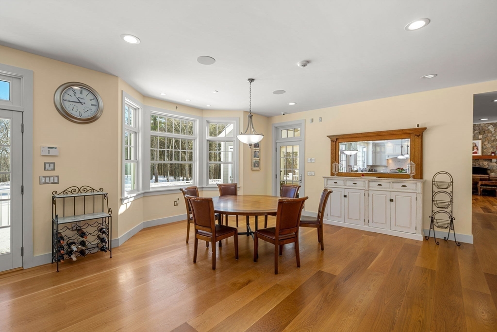72 Dale Lane Groton, MA 01450 - Photo 12 of 42 a view of a dining room with furniture window and wooden floor