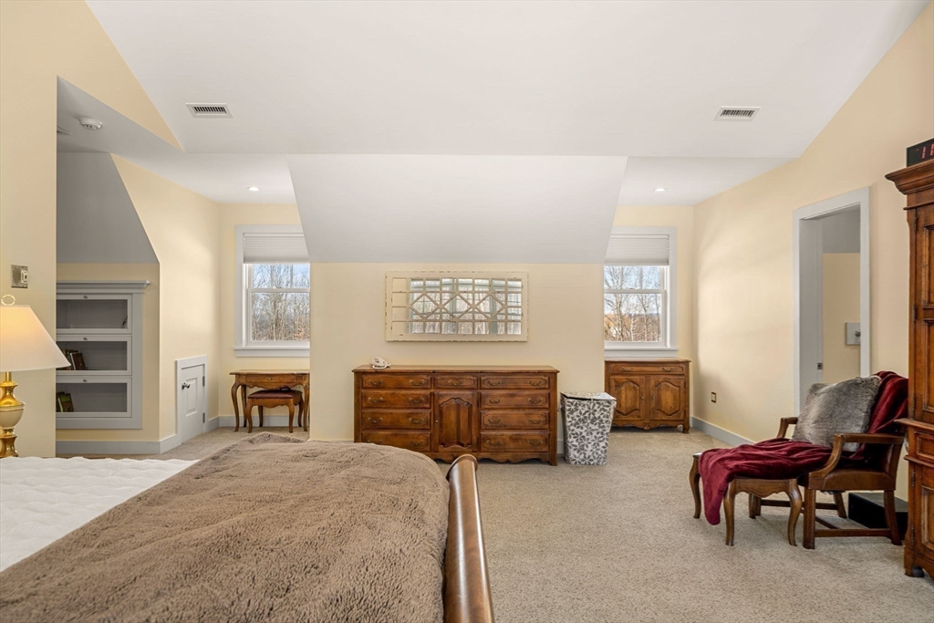 72 Dale Lane Groton, MA 01450 - Photo 19 of 42 a spacious bedroom with a bed and furniture