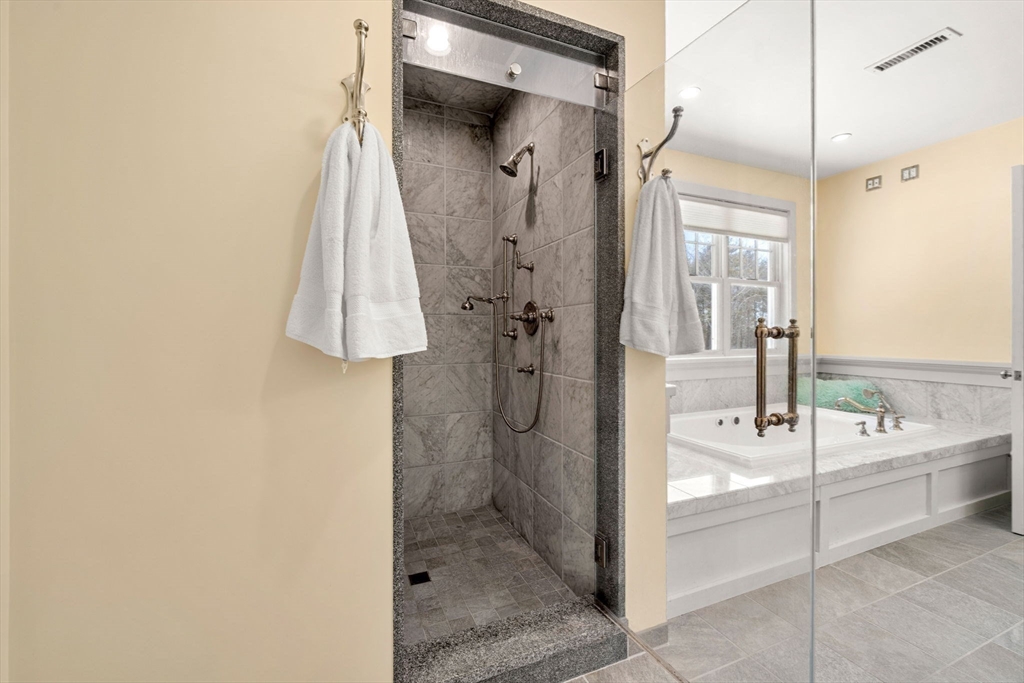 72 Dale Lane Groton, MA 01450 - Photo 21 of 42 a bathroom with a bath tub sink shower and mirror