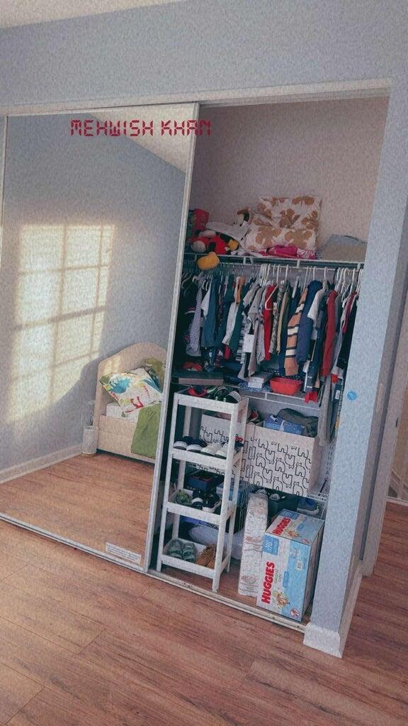 2891 Cedar Dunes Drive Port St. Lucie, FL 34953 - Photo 18 of 25 a view of a room with wooden floor and closet