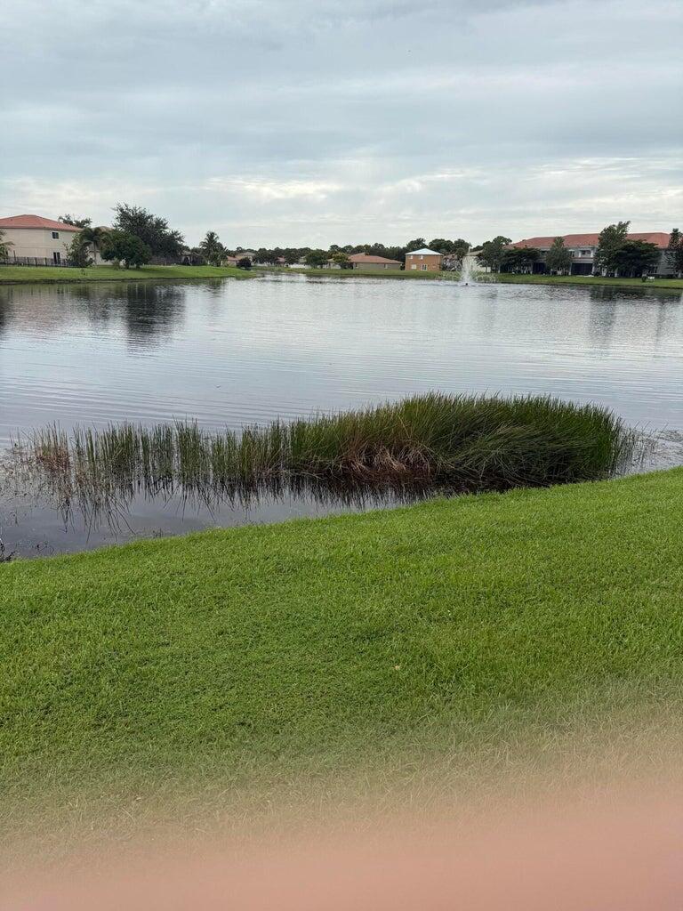 2891 Cedar Dunes Drive Port St. Lucie, FL 34953 - Photo 24 of 25 a view of a lake