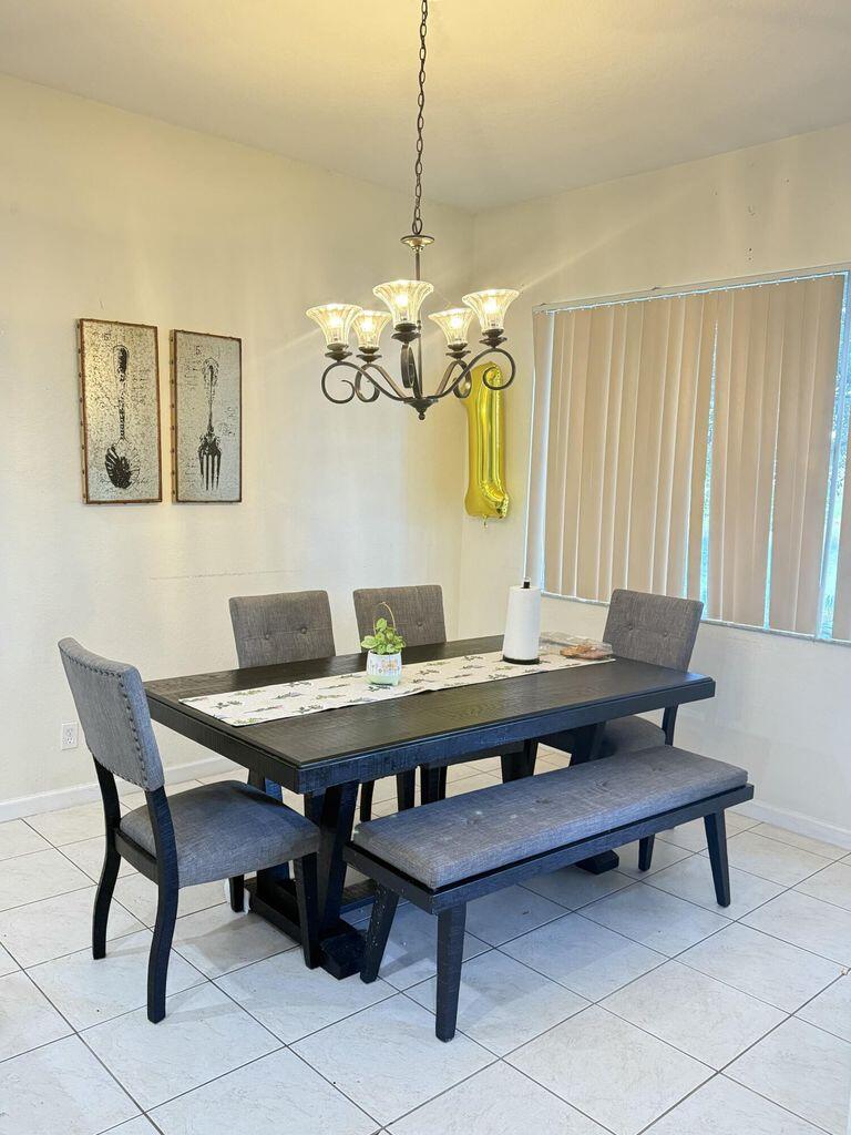 2891 Cedar Dunes Drive Port St. Lucie, FL 34953 - Photo 7 of 25 a view of a work space with furniture