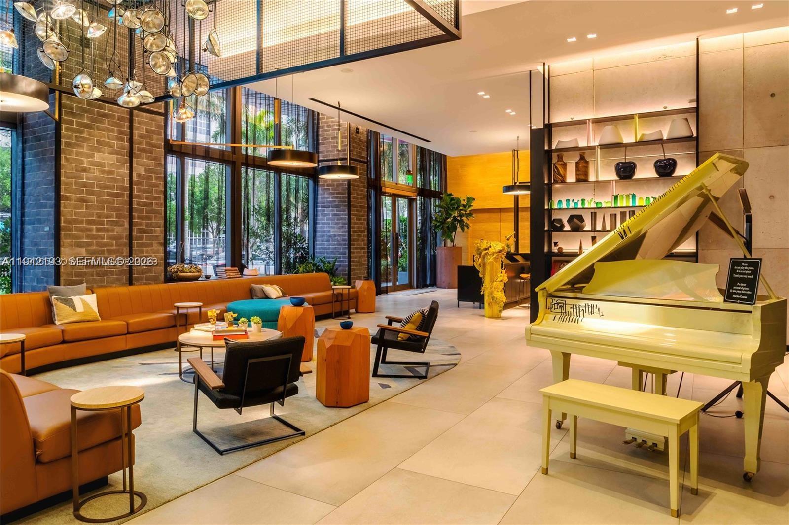 121 Northeast 34th Street, Unit 1008 Miami, FL 33137 - Photo 28 of 52 a outdoor space with patio furniture