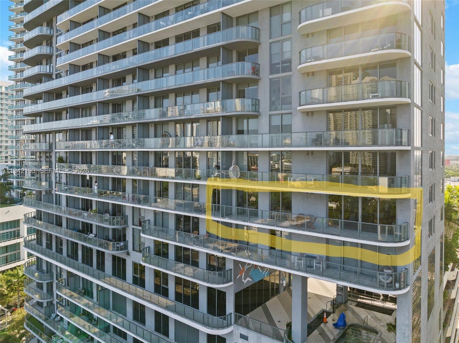 121 Northeast 34th Street, Unit 1008 Miami, FL 33137 - Photo 46 of 52 a picture of a building with glass windows