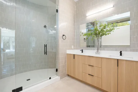 a bathroom with a bathtub and a sink