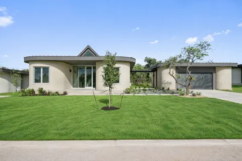 a house view with a garden space