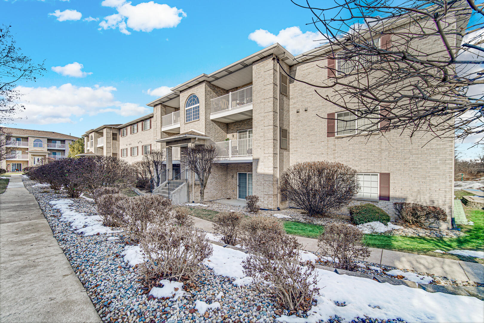 2007 West 75th Place, Unit 31 Merrillville, IN 46410 - Photo 1 of 17 a view of a house with a yard