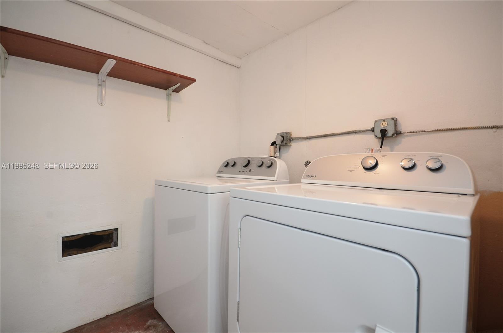2430 Southwest 16th Street, Unit 2430 Miami, FL 33145 - Photo 15 of 18 a close up of a sink and a vanity in a bathroom