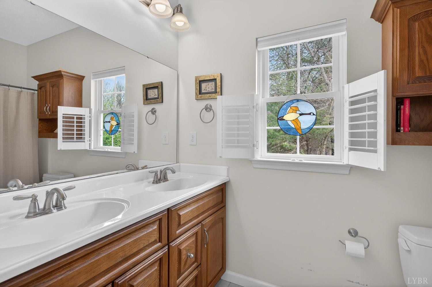 3805 Whipping Creek Road Gladys, VA 24554 - Photo 12 of 96 a bathroom with a granite countertop sink and a mirror