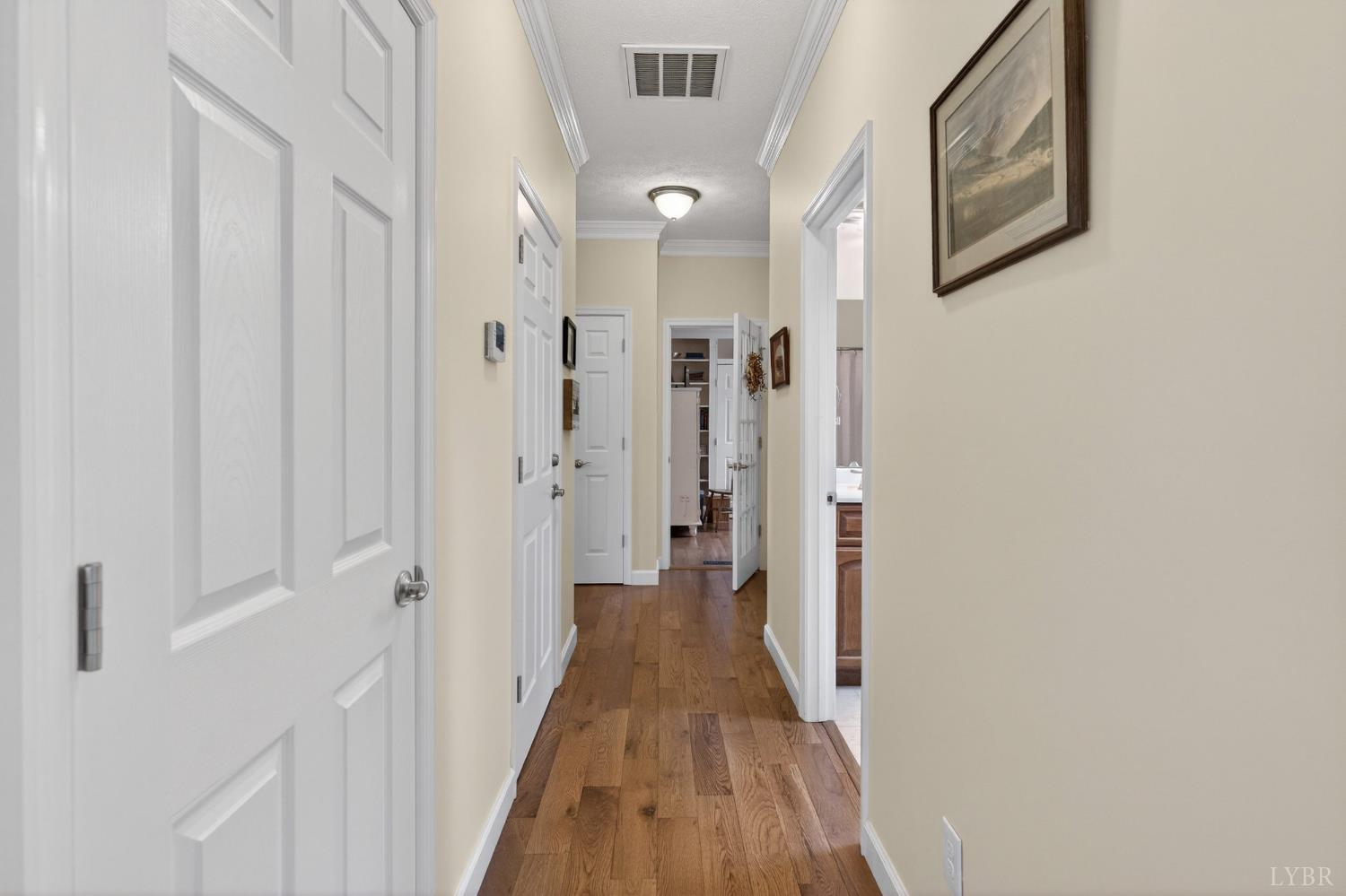 3805 Whipping Creek Road Gladys, VA 24554 - Photo 15 of 96 a view of a hallway with wooden floor and staircase