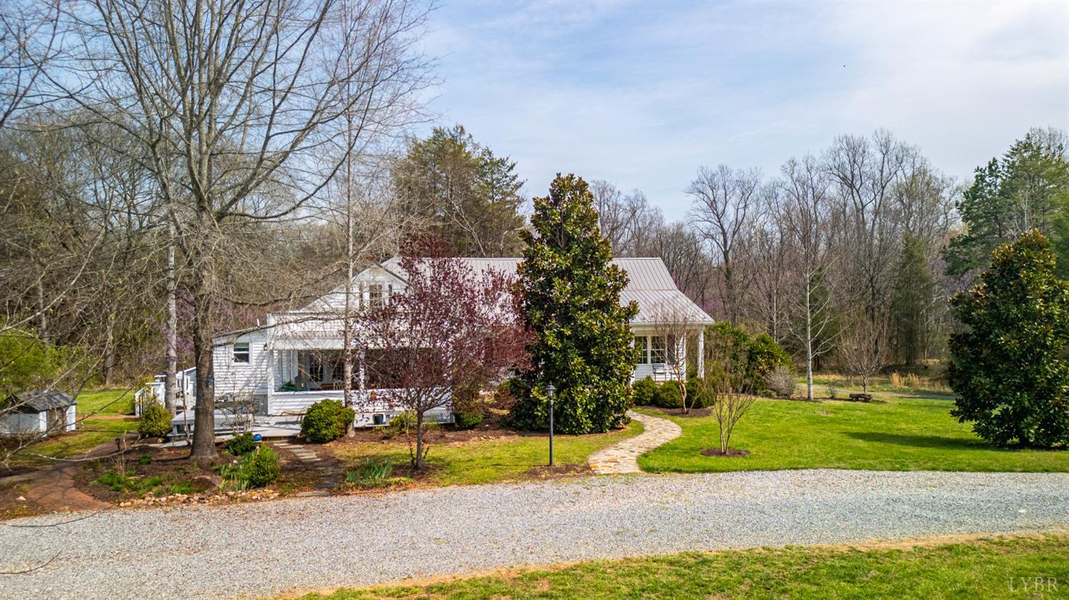 3805 Whipping Creek Road Gladys, VA 24554 - Photo 3 of 96 a view of a house with a yard and large trees