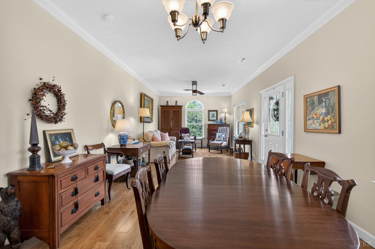 3805 Whipping Creek Road Gladys, VA 24554 - Photo 35 of 96 a view of a dining room and livingroom with furniture wooden floor a chandelier