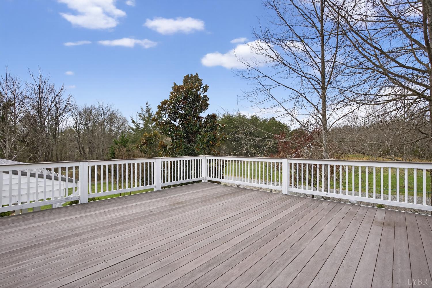 3805 Whipping Creek Road Gladys, VA 24554 - Photo 43 of 96 a view of deck with wooden floor and fence with wooden fence