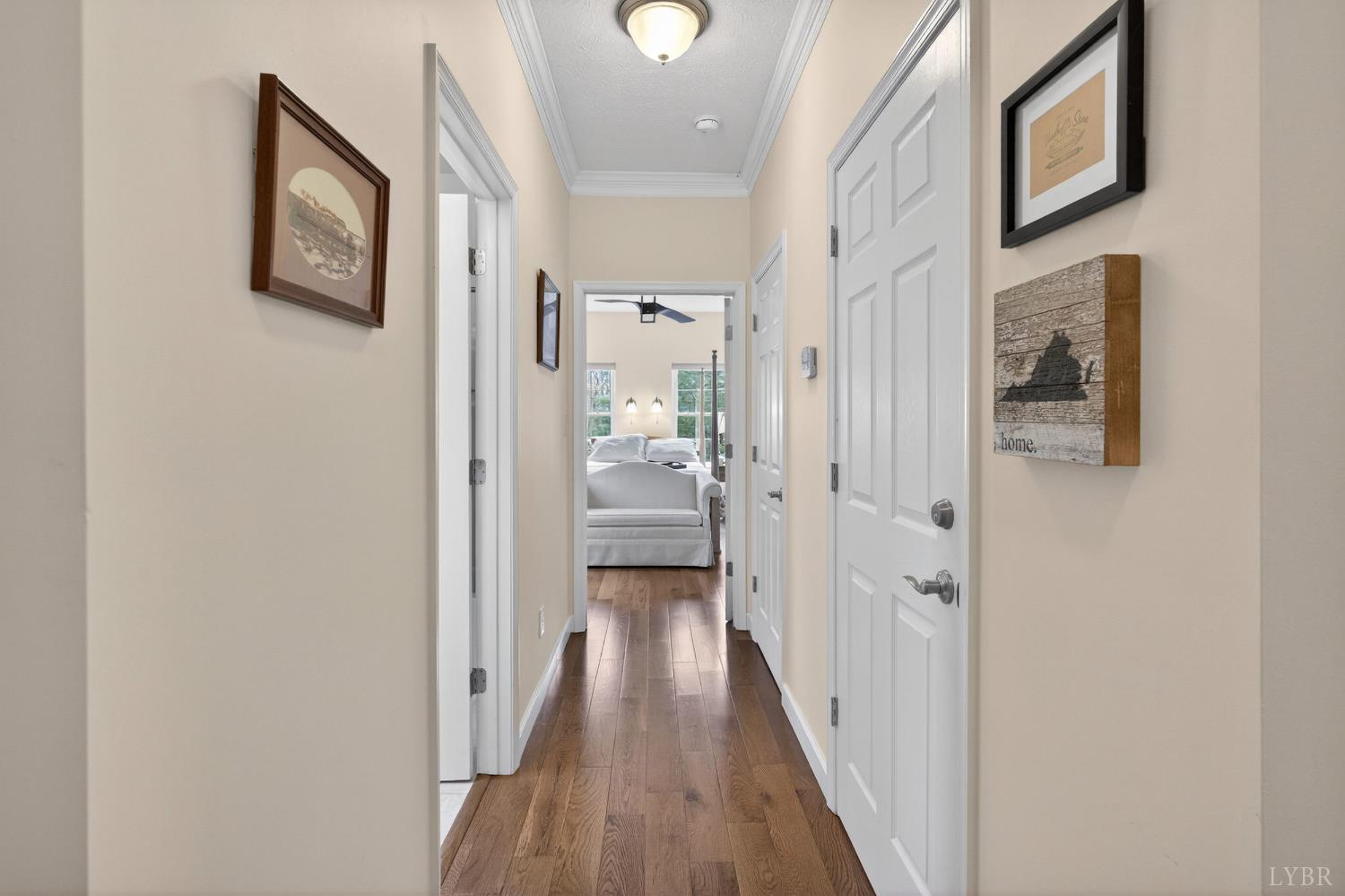 3805 Whipping Creek Road Gladys, VA 24554 - Photo 10 of 96 a view of a hallway with wooden floor and a bathroom