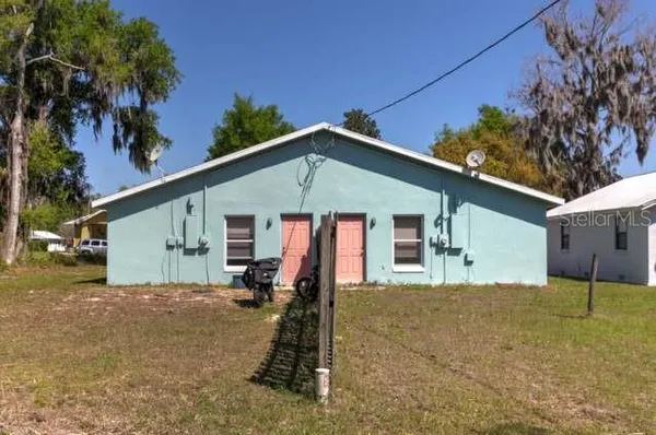 a house view with a outdoor space