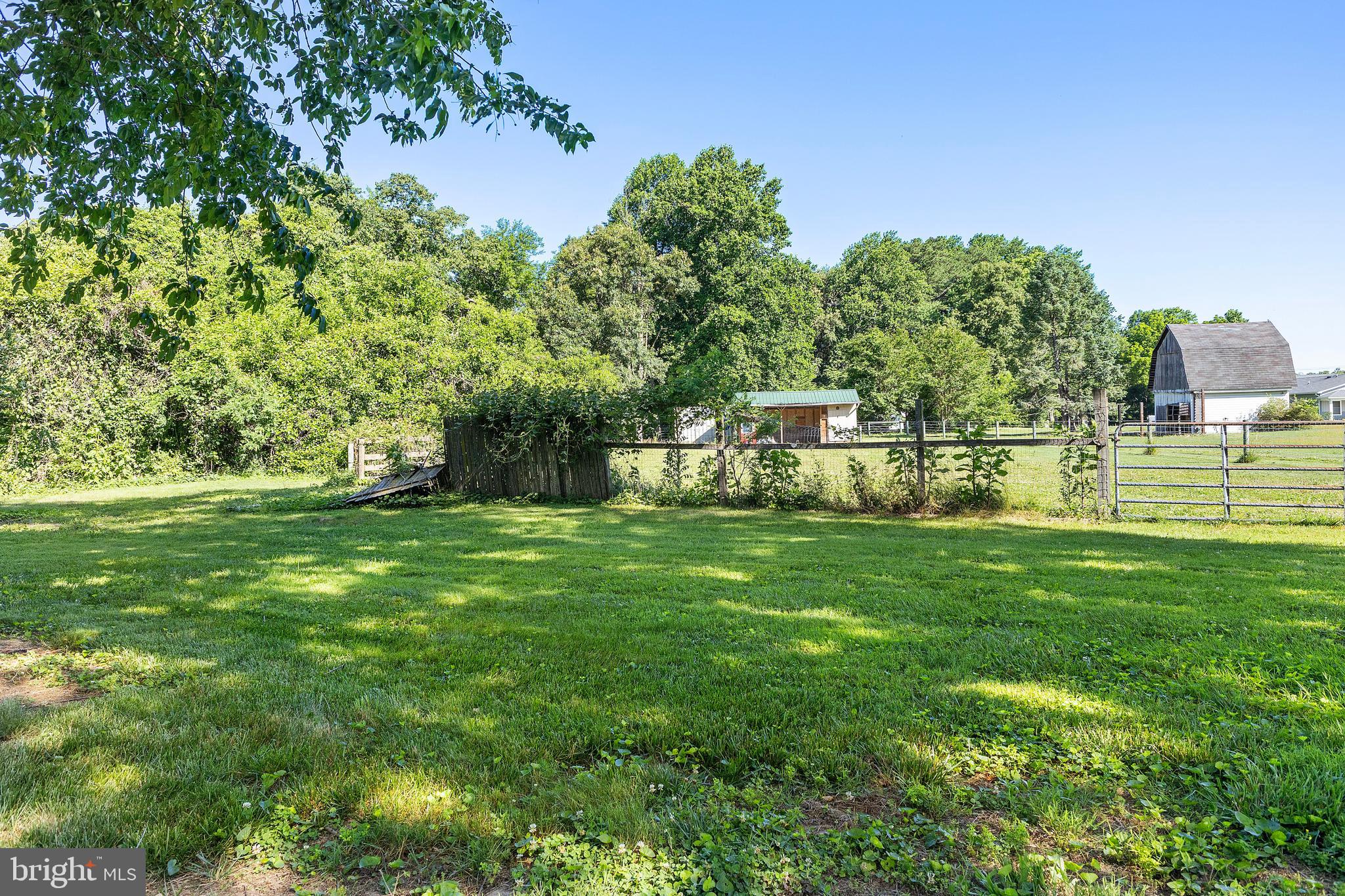 7112 East New Market Ellwood Road Hurlock, MD 21643 - Photo 26 of 41 a view of a house with a big yard