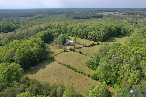 an aerial view of residential house with outdoor space