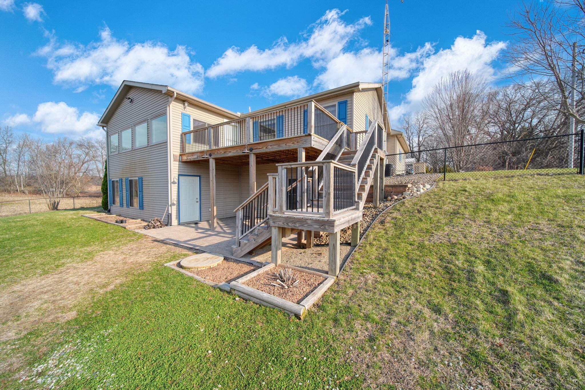 11323 Miner Road Parma, MI 49269 - Photo 11 of 65 deck-patio-overlooking-acreage.jpg