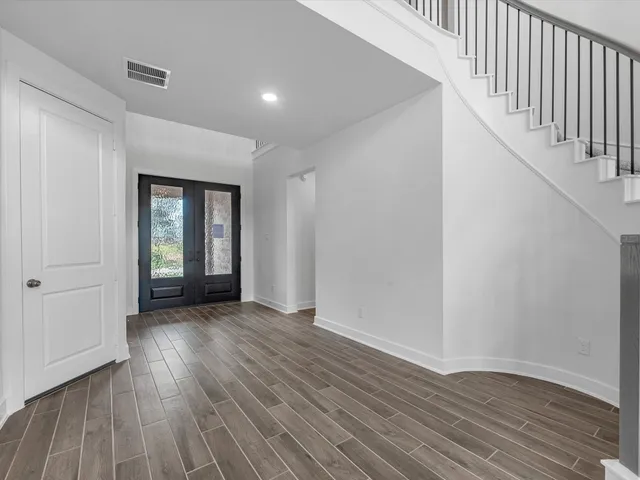 an empty room with windows