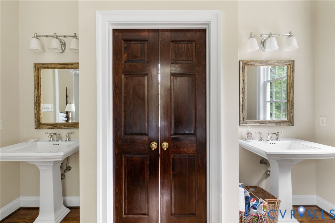13173 Scotchtown Road Beaverdam, VA 23015 - Photo 37 of 65 a bathroom with a sink and a mirror