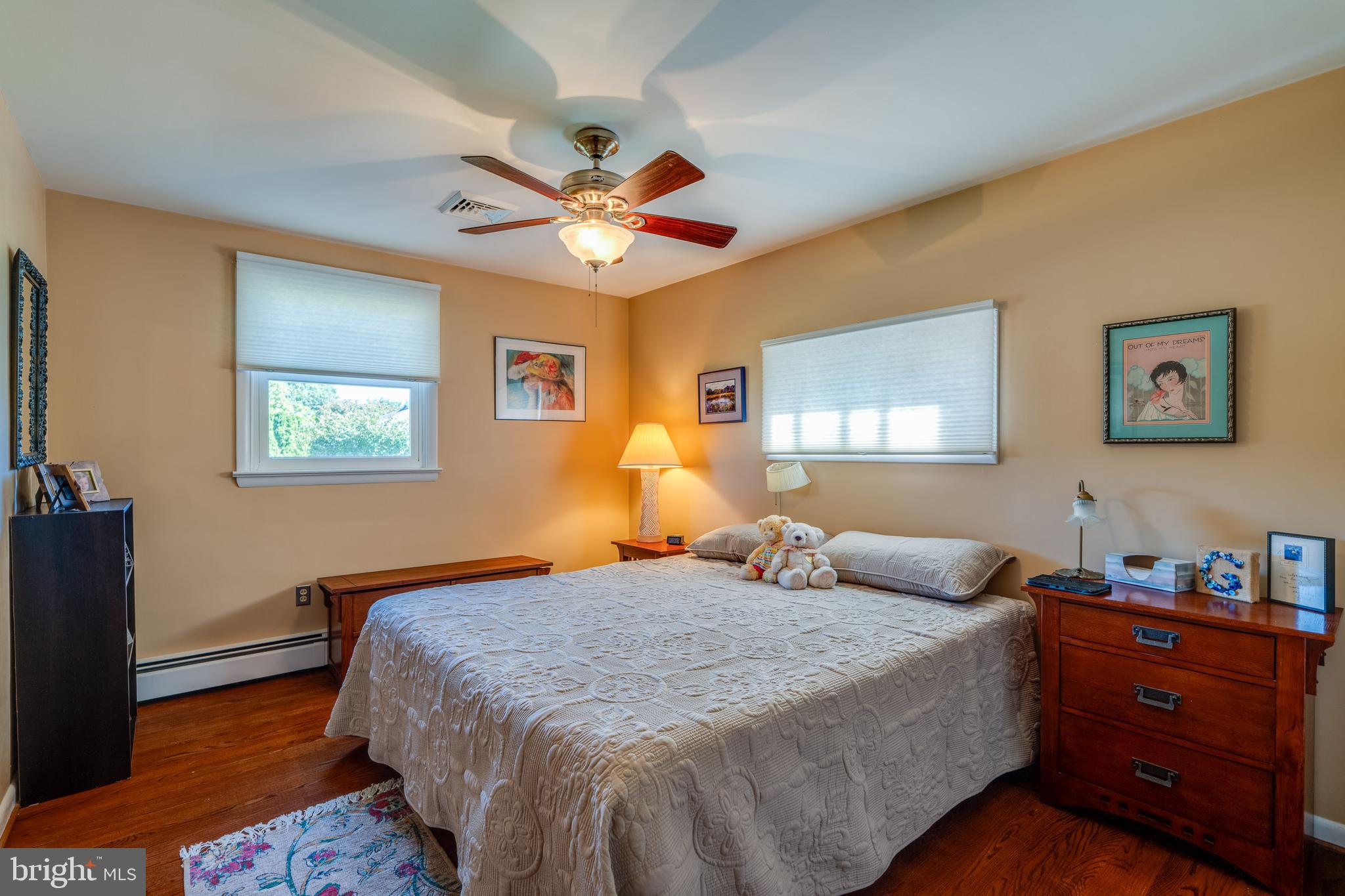510 Bluebird Road Lititz, PA 17543 - Photo 14 of 32 a bedroom with a bed and a chandelier
