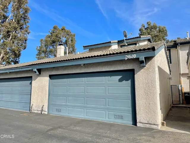 a view of a house with a garage
