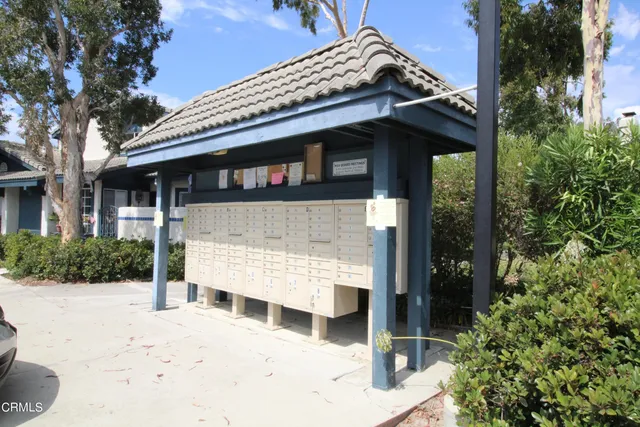 a view of a house with a yard and garage