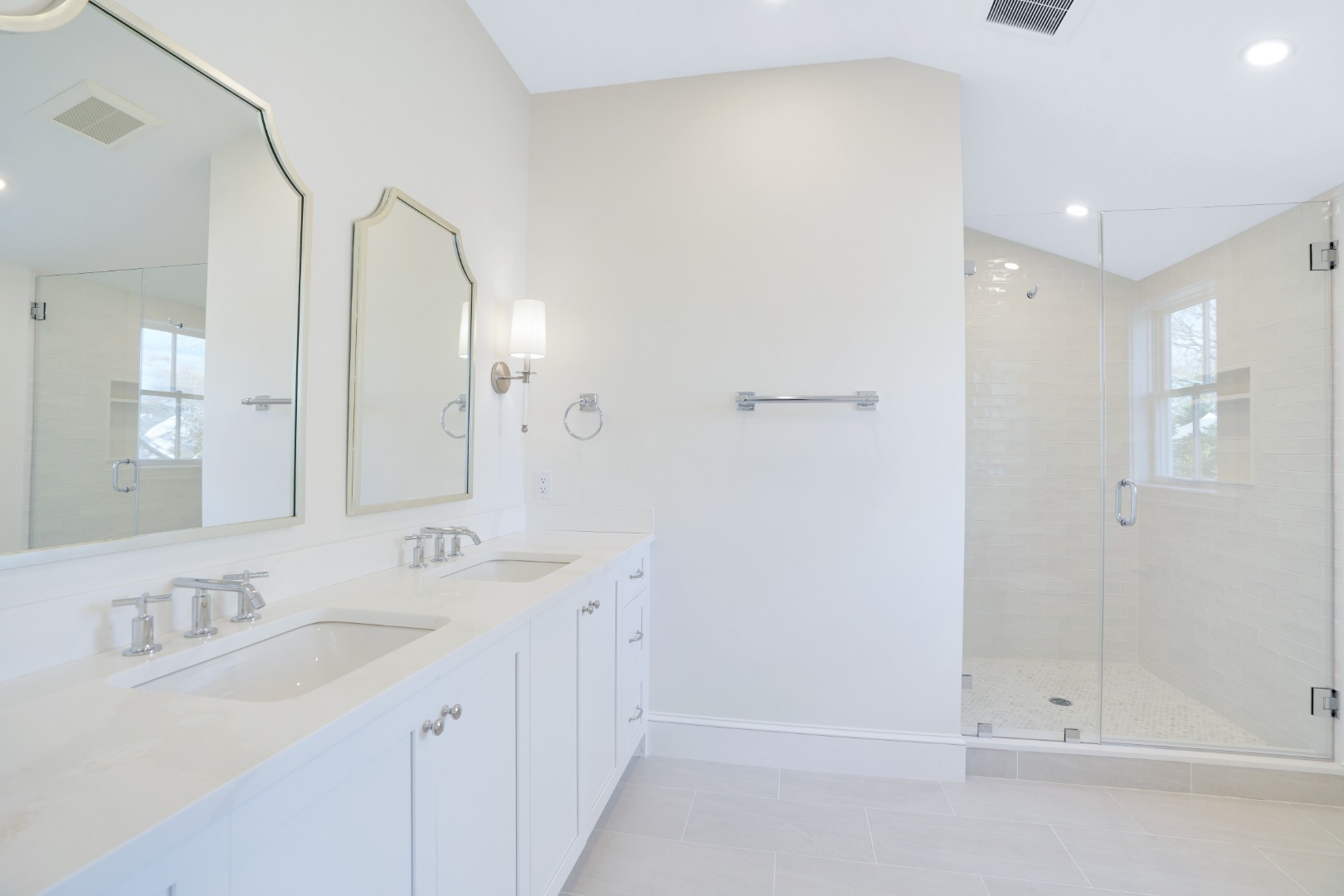 23 Pinehurst Road Edgartown, MA 02539 - Photo 43 of 57 a bathroom with a double vanity sink mirror and