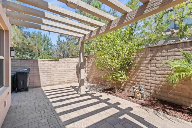 an aerial view of a house with outdoor space