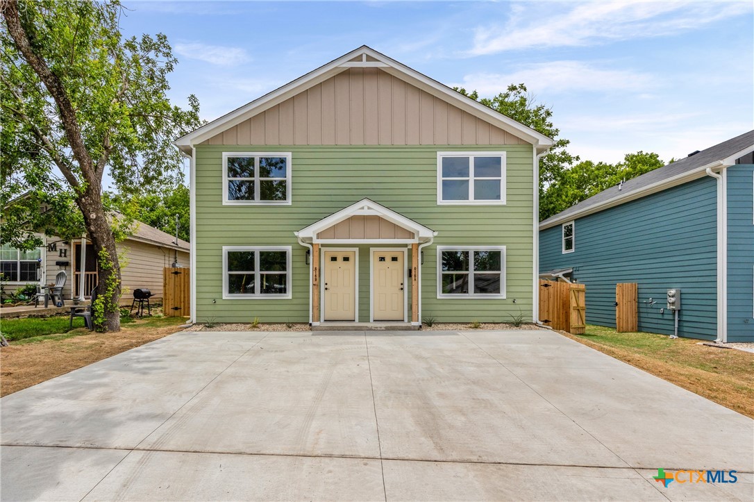 820 South 24th Street, Unit A Temple, TX 76501 - Photo 1 of 25 a view of a house with a yard and large tree