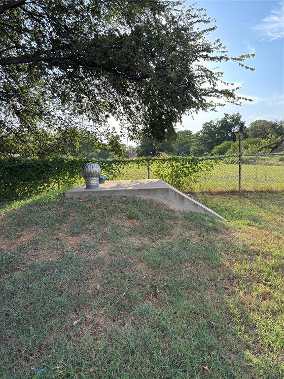 903 1st Street Bridgeport, TX 76426 - Photo 14 of 17 a view of a field with trees in the background