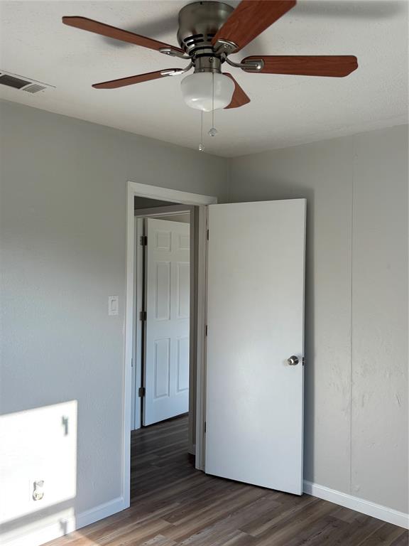 903 1st Street Bridgeport, TX 76426 - Photo 6 of 17 a view of a hallway with wooden floor