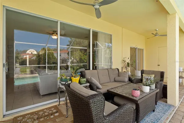 a living room with furniture and a window