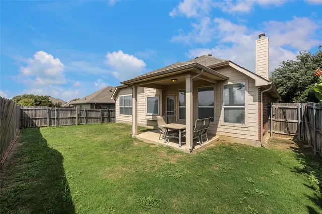 a front view of a house with a garage