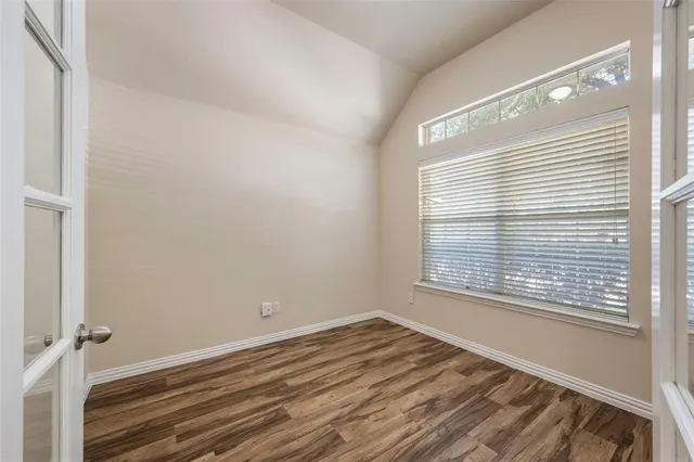 a view of a room that has a window in it