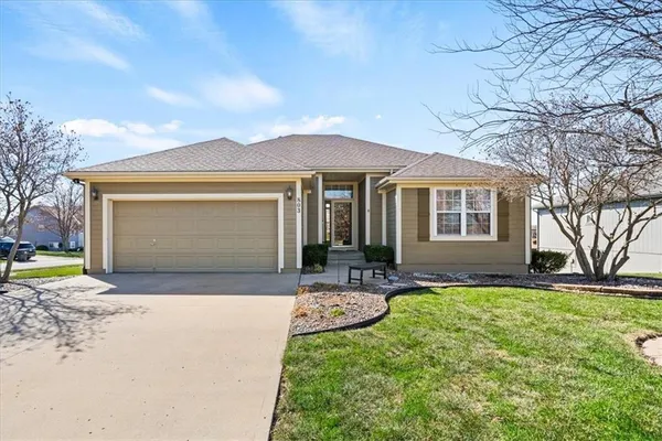 $415,000 | 803 Northwest Redbud Drive, Grain Valley, MO 64029