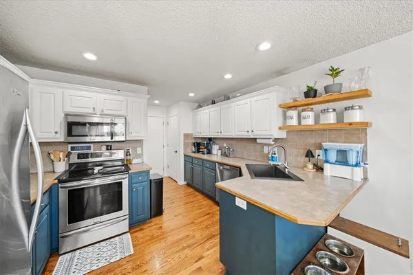 $415,000 | 803 Northwest Redbud Drive, Grain Valley, MO 64029