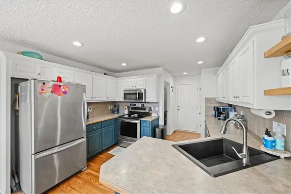 $415,000 | 803 Northwest Redbud Drive, Grain Valley, MO 64029