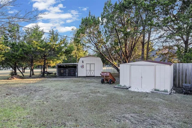 a view of a house with a garage and a garage