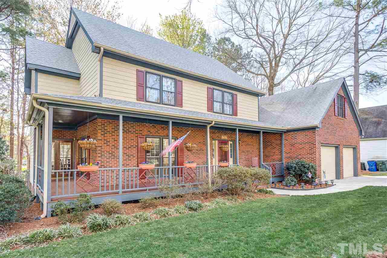 8108 Mourning Dove Road Raleigh, NC 27615 - Photo 2 of 25 a front view of a house with garden