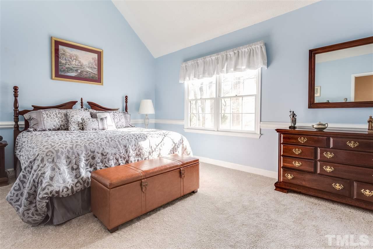 8108 Mourning Dove Road Raleigh, NC 27615 - Photo 20 of 25 a living room with furniture and a window